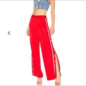 Lovers + Friends red snap pants, brand new